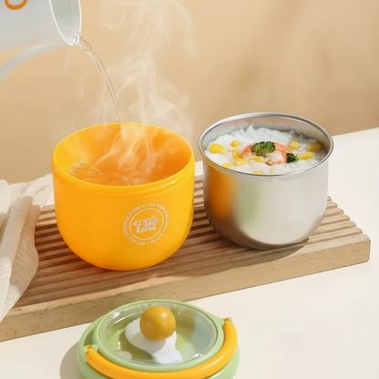 Détail du bol repas en inox et de sa cuillère