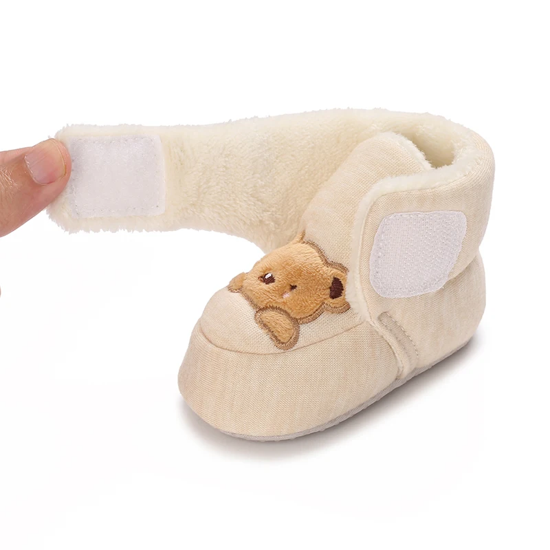 Paire de chaussures d’intérieur doublées pour bébé