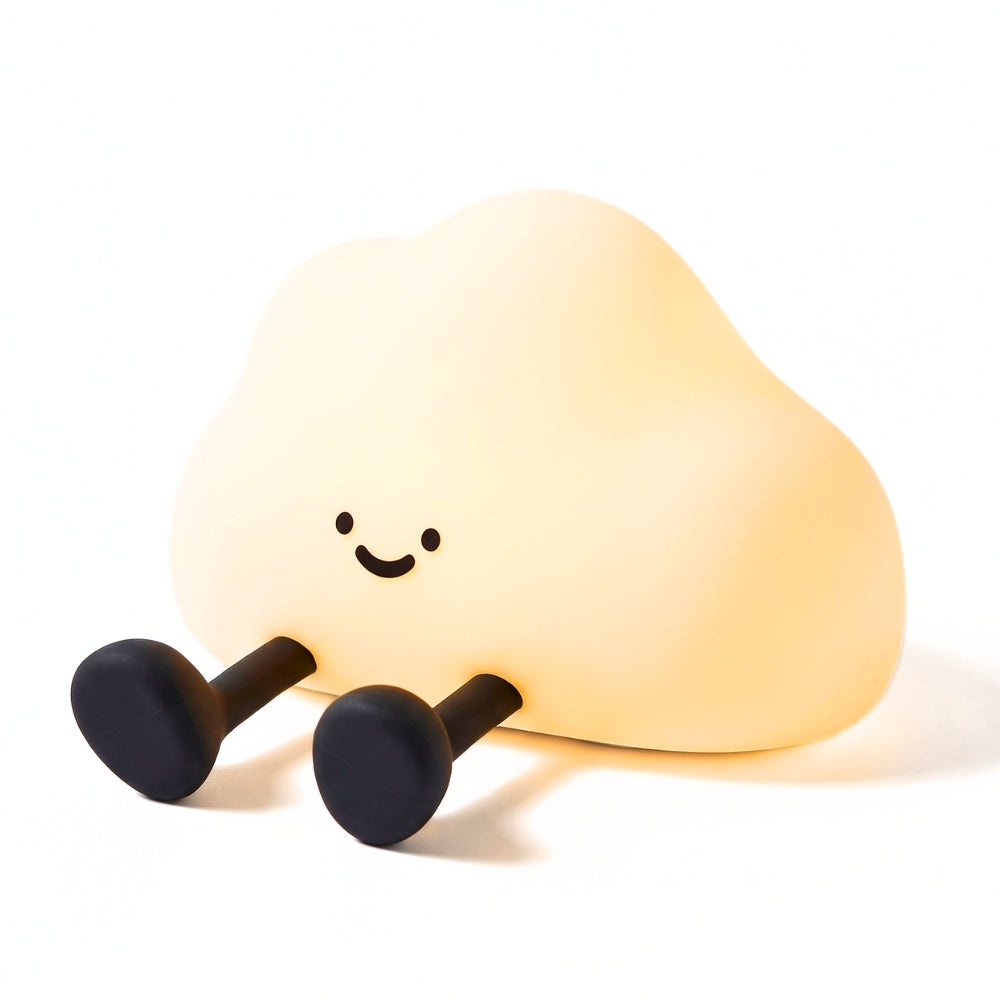 Veilleuse nuage en silicone posée sur une table de chevet