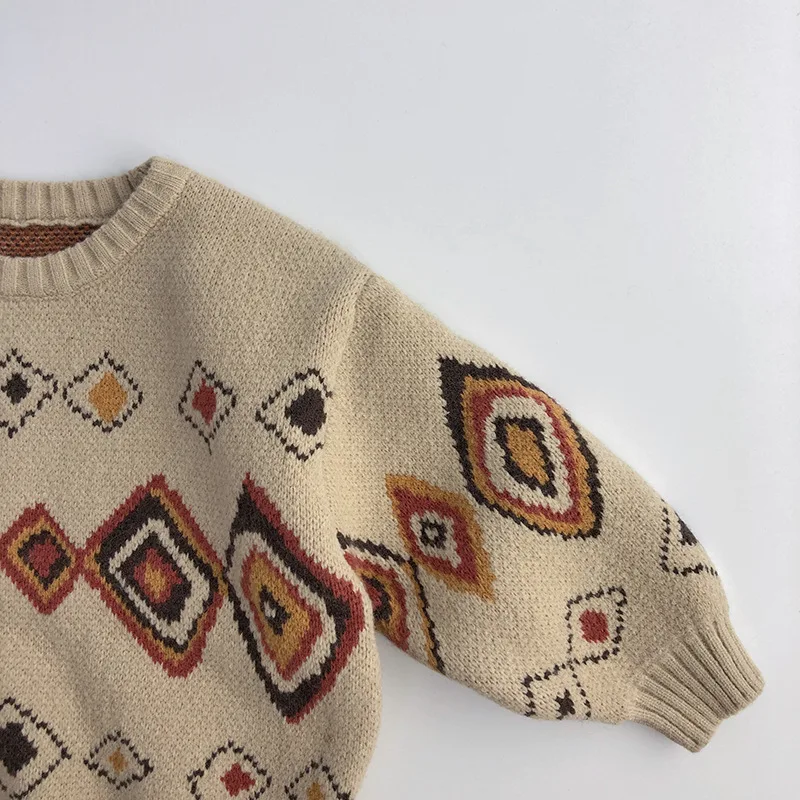 Vue de dos du pull enfant tricoté