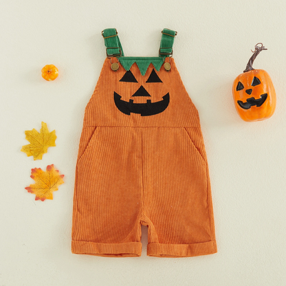Détail de la salopette bébé pour la fête d’Halloween