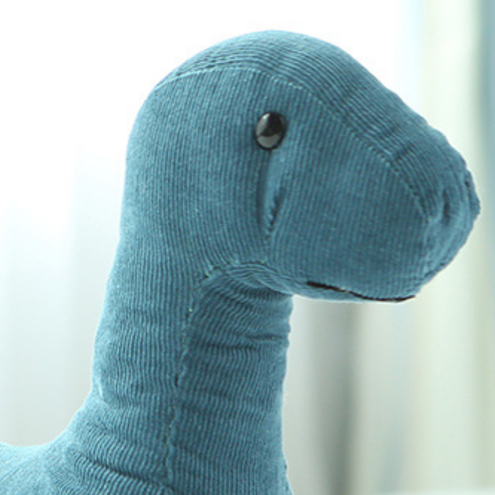 Peluche dinosaure douce adaptée aux câlins des enfants