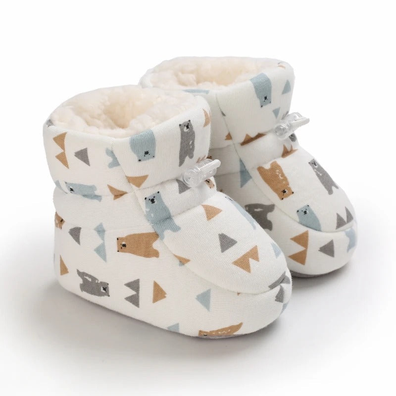 Bottines pour bébé conçues pour garder les pieds bien au chaud