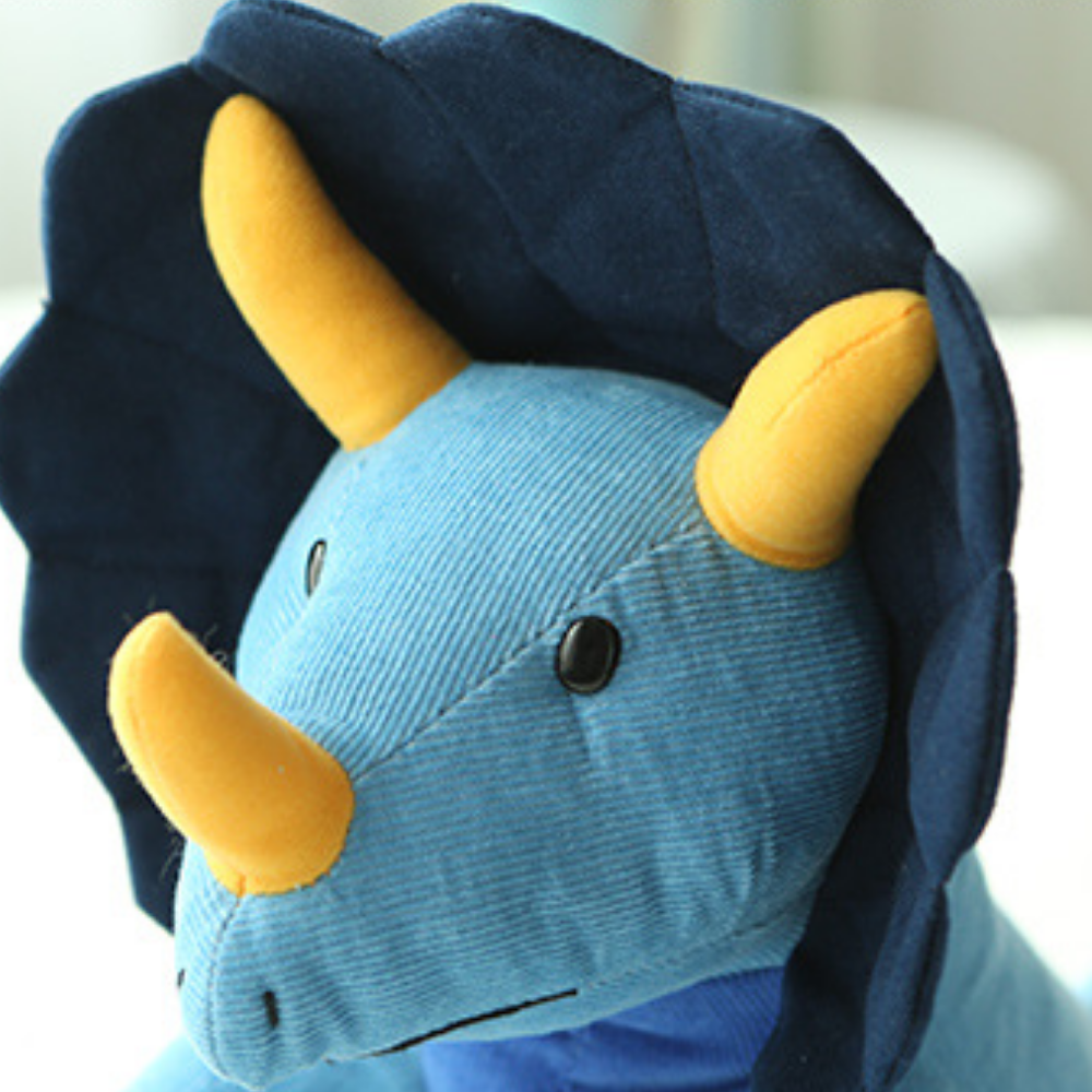 Jouet dinosaure en peluche pour stimuler l’imagination