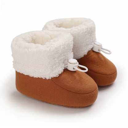 Semelles souples des bottines d’hiver pour bébé