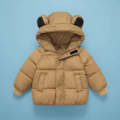 Manteau d’hiver enfant porté lors d’une sortie en plein air