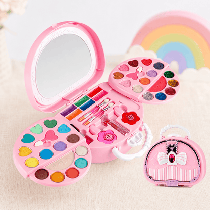 Trousse de maquillage pour enfants ouverte avec miroir intégré et espace de rangement.