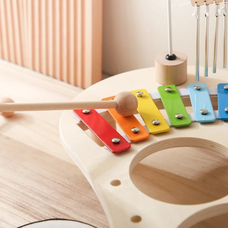 Set de jouets musicaux en bois présenté pour une idée cadeau enfant